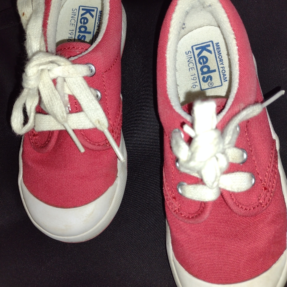 Keds red kids sneakers.